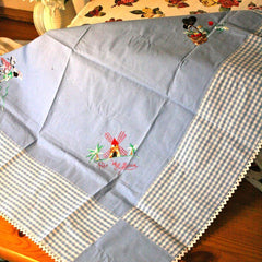 Cute blue and white gingham and hand stitched tablecloth and six matchin... click for more information