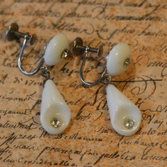 These unusual white plastic drop earrings with screw fix clasp date from... click for more information