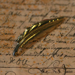  Gold plated feather tie pin measuring 45mm in width and in excelle... click for more information